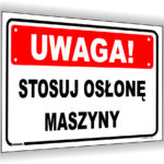 UWAGA! Stosuj osłonę maszyny